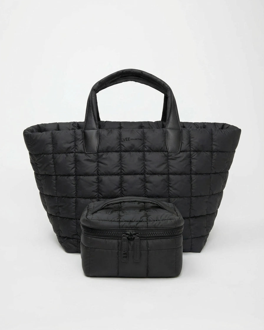 Front view of the black Weekend Away tote with the small zip pouch placed in front