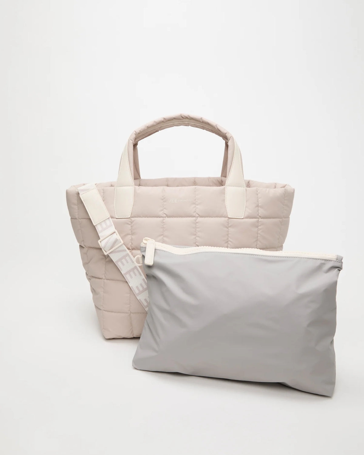 Front view of the Porter Tote Bag Medium in Soft Taupe, shown with its matching pouch and detachable strap.