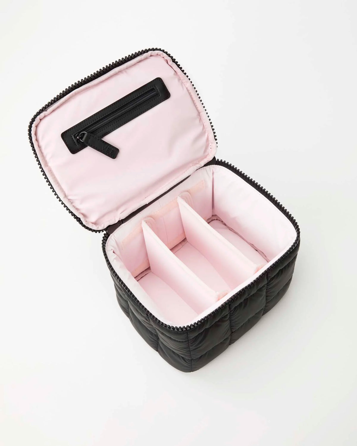 Product photo of the Porter Vanity Case Tall in matt black, slightly angled to the side and open, showing the light pink interior.