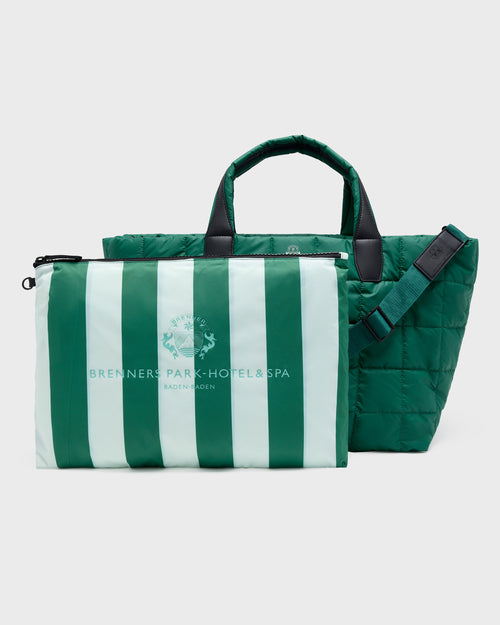 A green and white striped zippered pouch in front of a dark green quilted tote bag, both featuring the Bredoners Park Hotel & Spa logo, on a light gray background.
