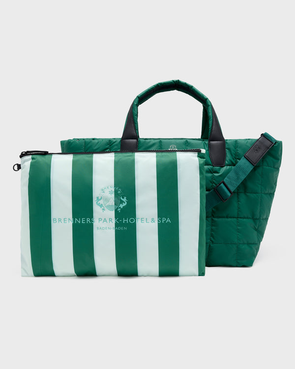 A green and white striped zippered pouch in front of a dark green quilted tote bag, both featuring the Bredoners Park Hotel & Spa logo, on a light gray background.