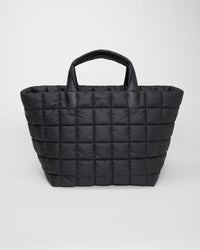 Black Weekender bag perfect for travel and carry-on use, lightweight and easy to carry. Features a vegan leather handle and is made from sustainable materials, combining eco-friendly design with practical functionality.