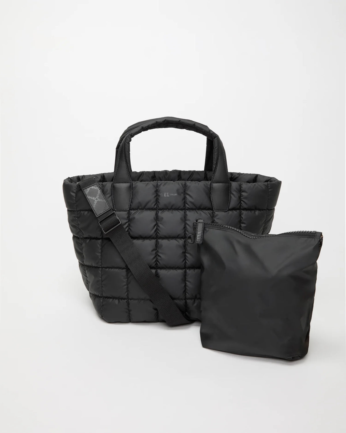 Front view of the Porter Tote Bag Medium in Matt Black by Vee Collective, shown with its matching pouch and detachable strap.
