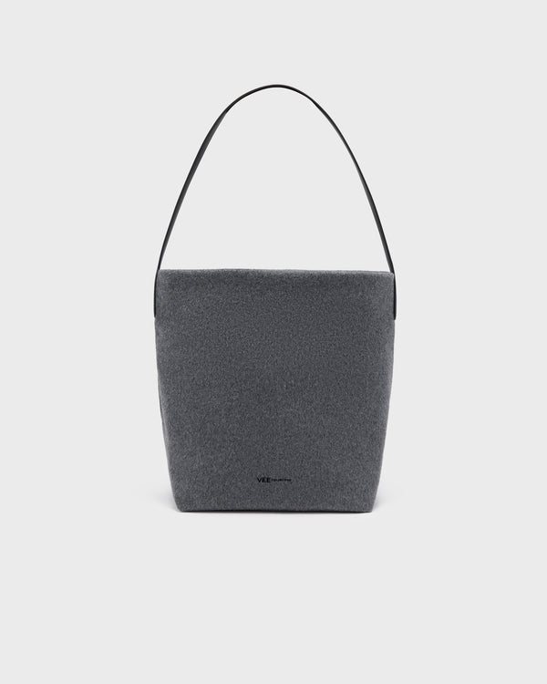 A dark gray felt shoulder bag with a slim black leather strap, shown against a light gray background. c__1
