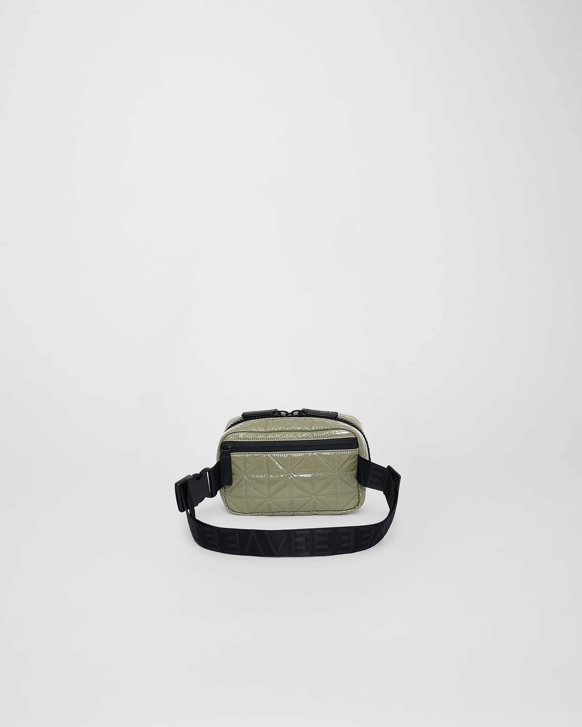 A front-view photo of a Vee Belt bag featuring a geometric stitched pattern and waist straps, set against a plain white background.