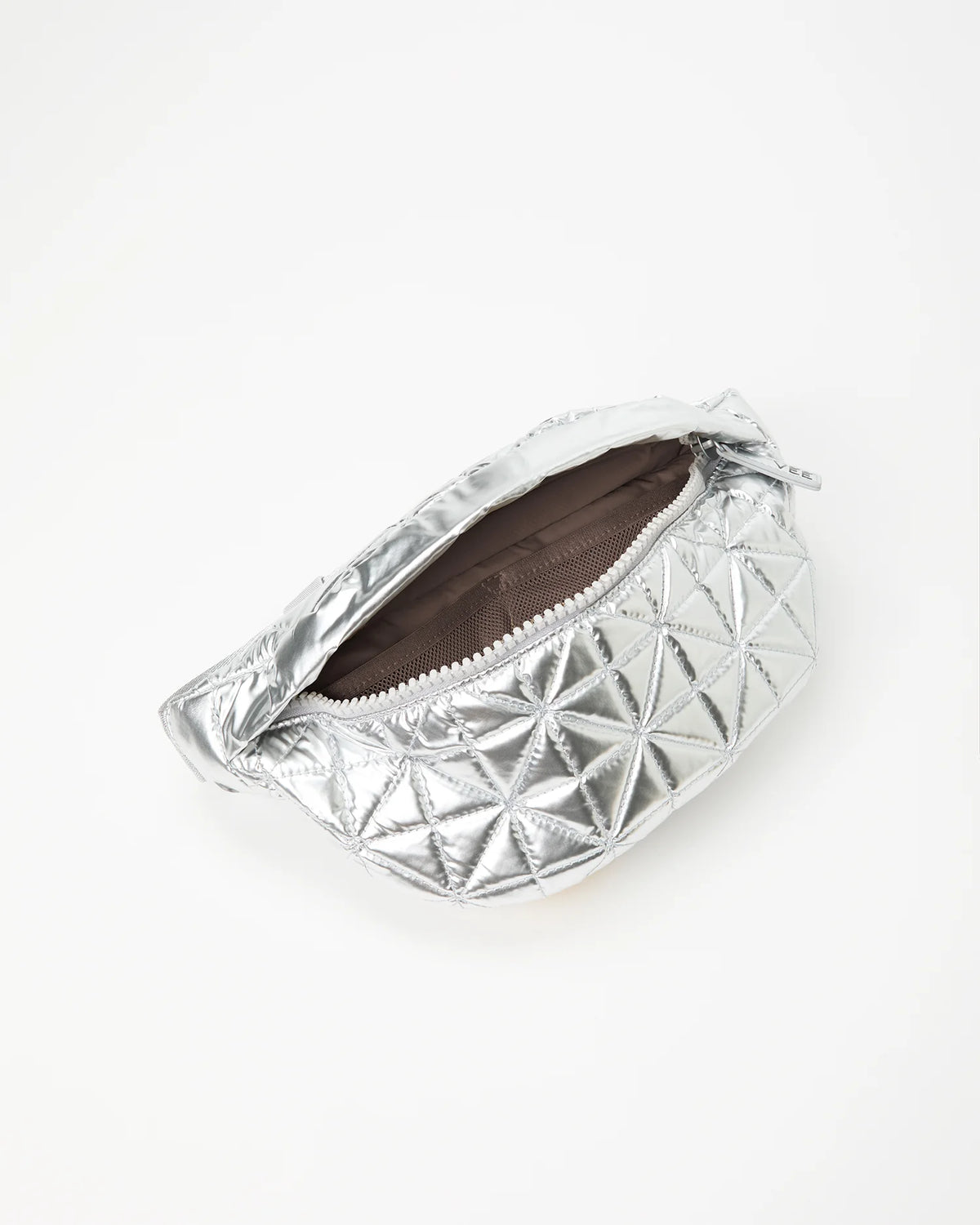 Silver quilted fanny pack bag with brown interior lining on a white background