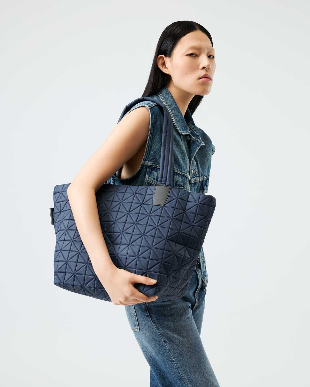 Spacious tote bag crafted from sustainable, waterproof materials, designed to be durable and versatile. Perfect for traveling, busy moms, gym sessions, everyday errands, and work. Combines practicality with eco-friendly style for all-day use.