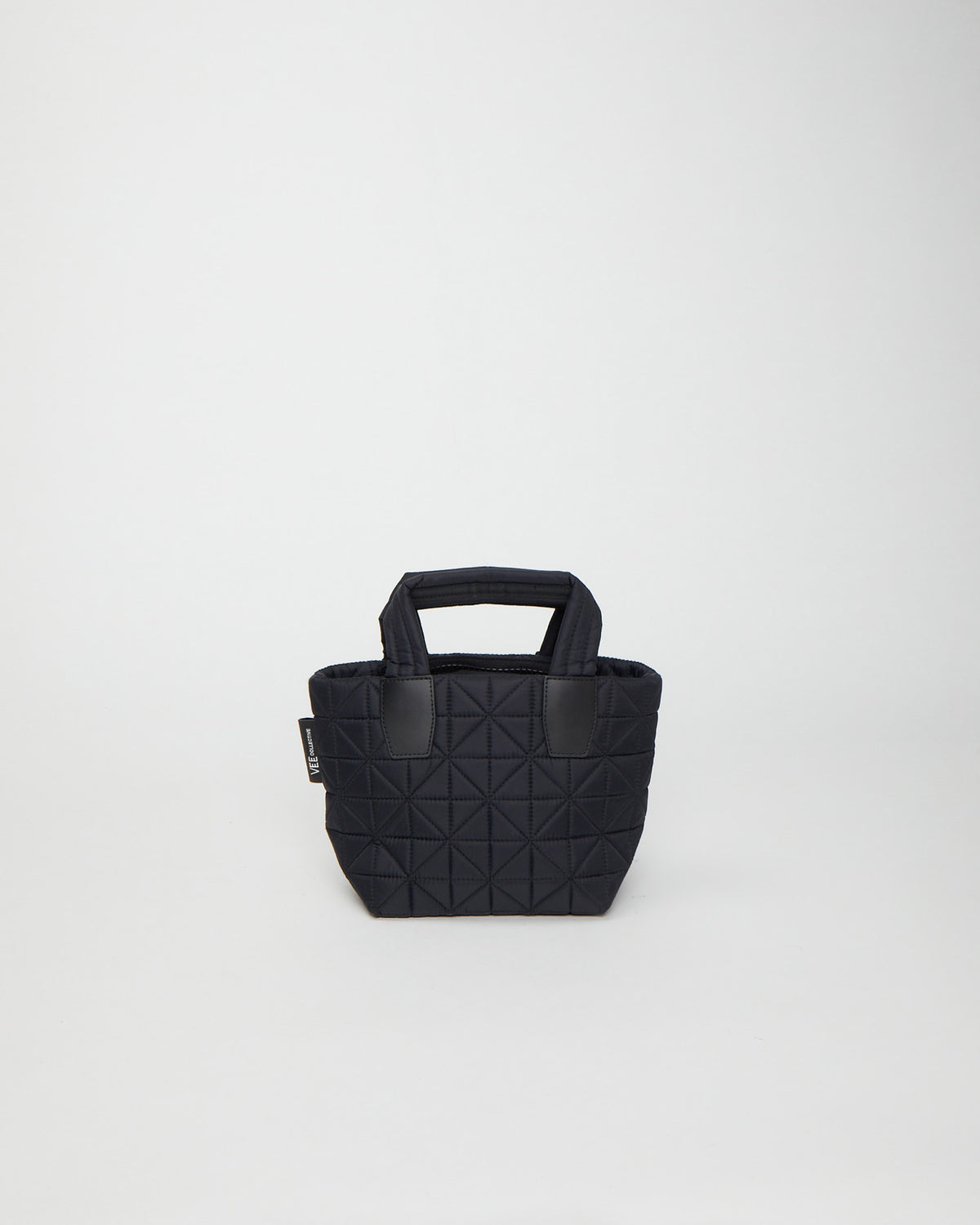 Mini tote bag designed to be versatile and lightweight, made from waterproof materials. Ideal for nights out, concerts, and carrying essentials in style.
