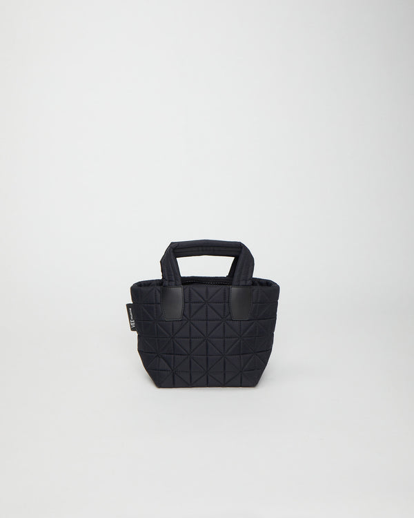 Mini tote bag designed to be versatile and lightweight, made from waterproof materials. Ideal for nights out, concerts, and carrying essentials in style.
