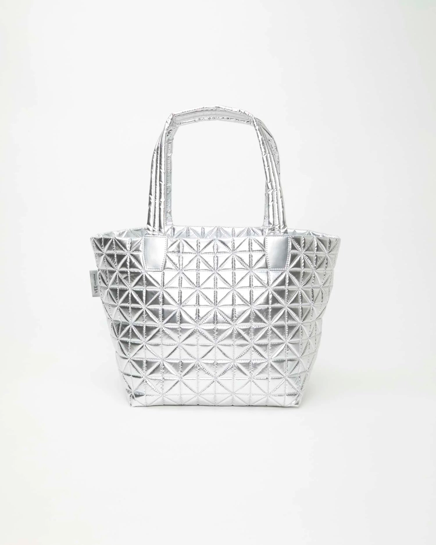 Medium chrome metallic tote with geometric diamond stitching and two handles