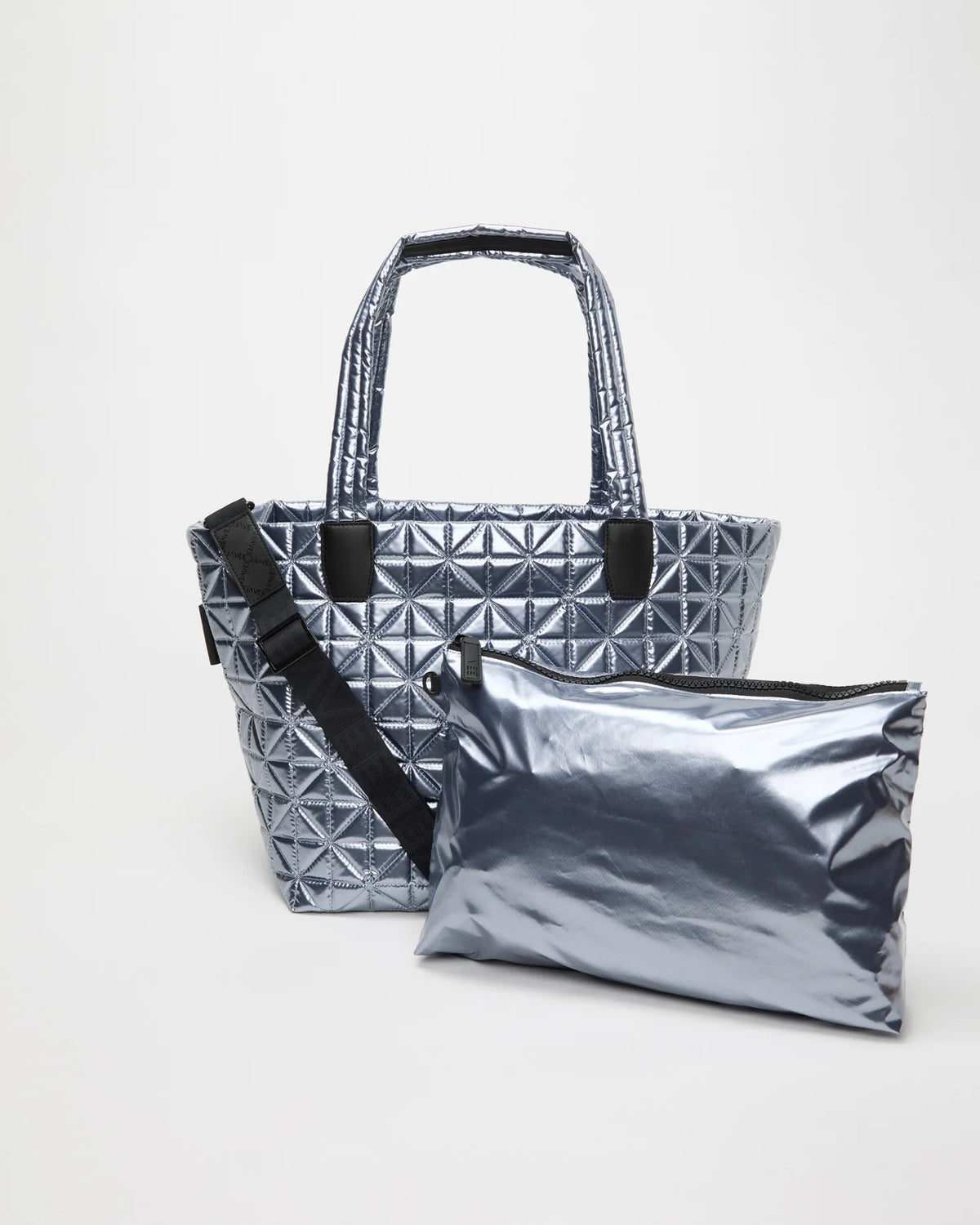 Front view of the Vee Tote Bag Medium in Icy Silver, shown with its matching pouch and detachable strap.