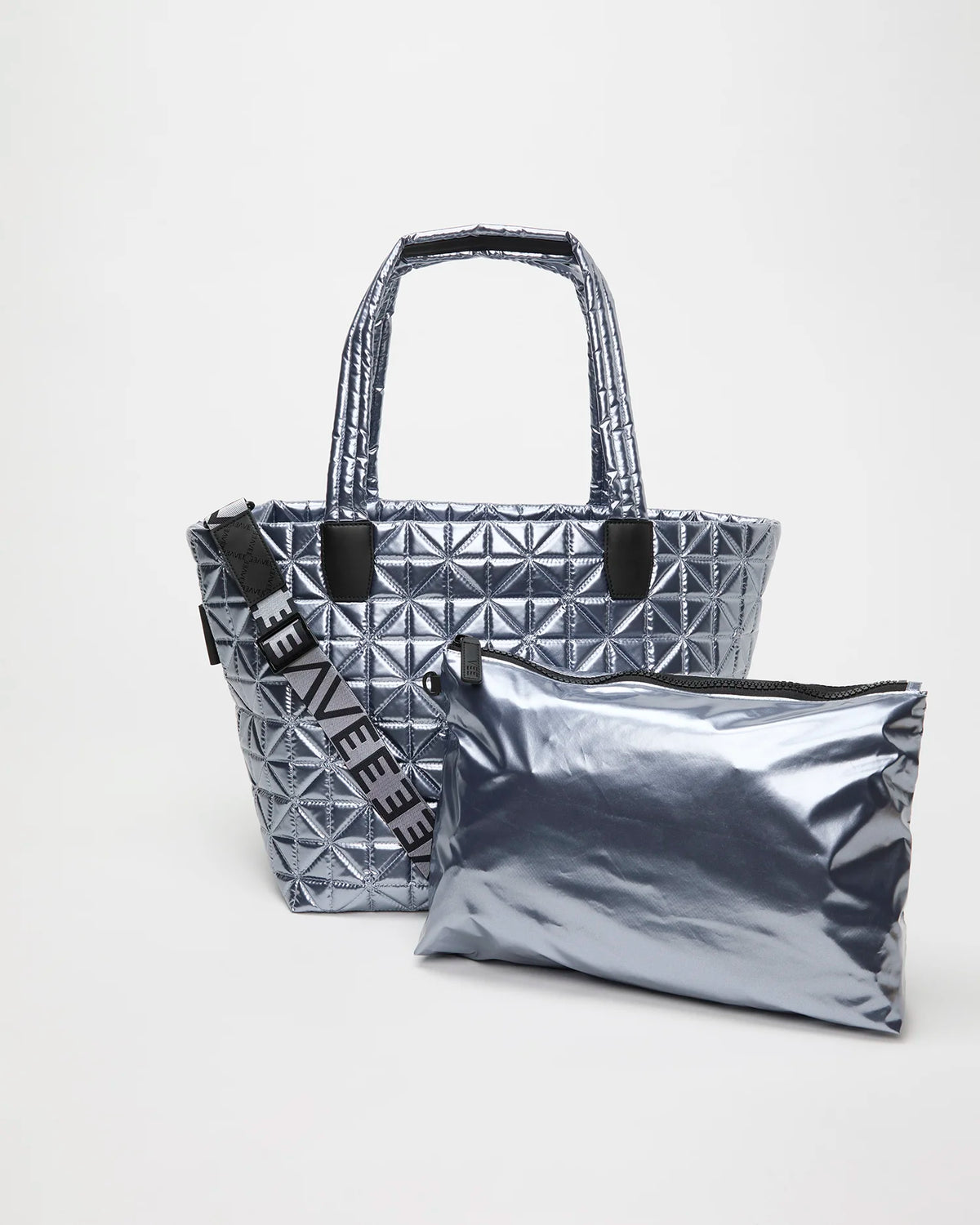 Vee Tote Medium Icy Silver with a geometric quilted surface and padded handles