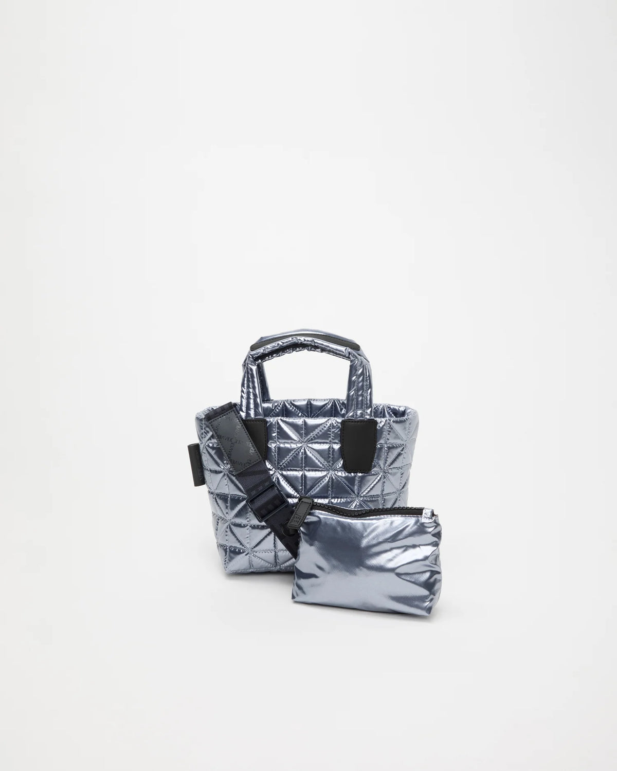 Front view of the Vee Tote Bag Mini in Icy Silver, shown with its matching pouch and detachable strap.