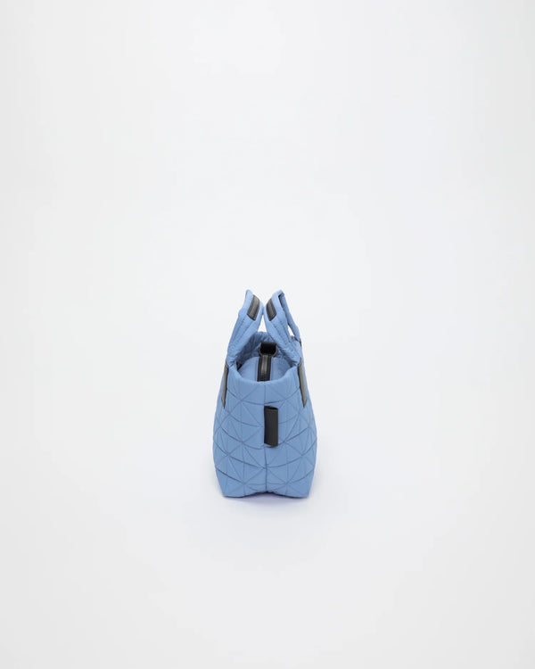 Side view product image of the Vee Tote Bag Mini in Pigeon Blue by Vee Collective.