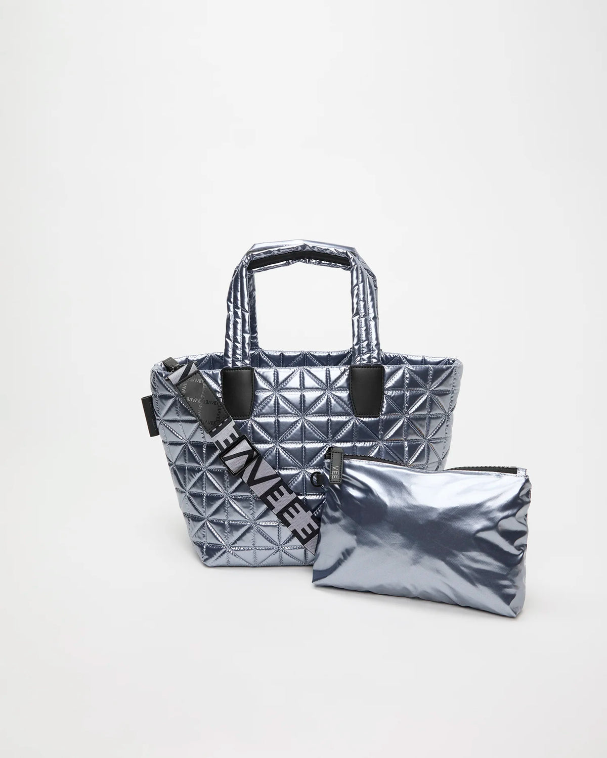 Vee Tote Small icy silver with diamond quilted panels top handles and a matching pouch