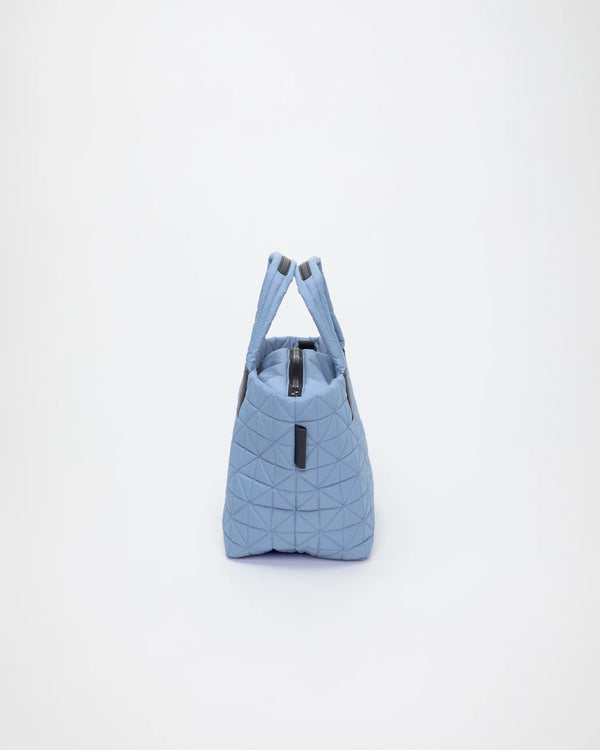 Side view product image of the Vee Tote Bag Small in Pigeon Blue by Vee Collective.